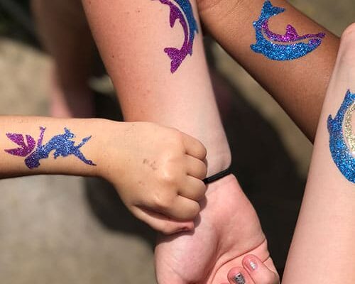 glitter tattoos on arms