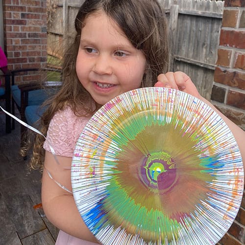 girl with art frisbee