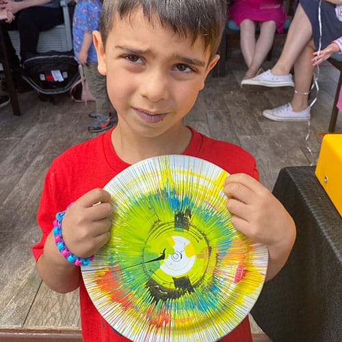 boy with art frisbee